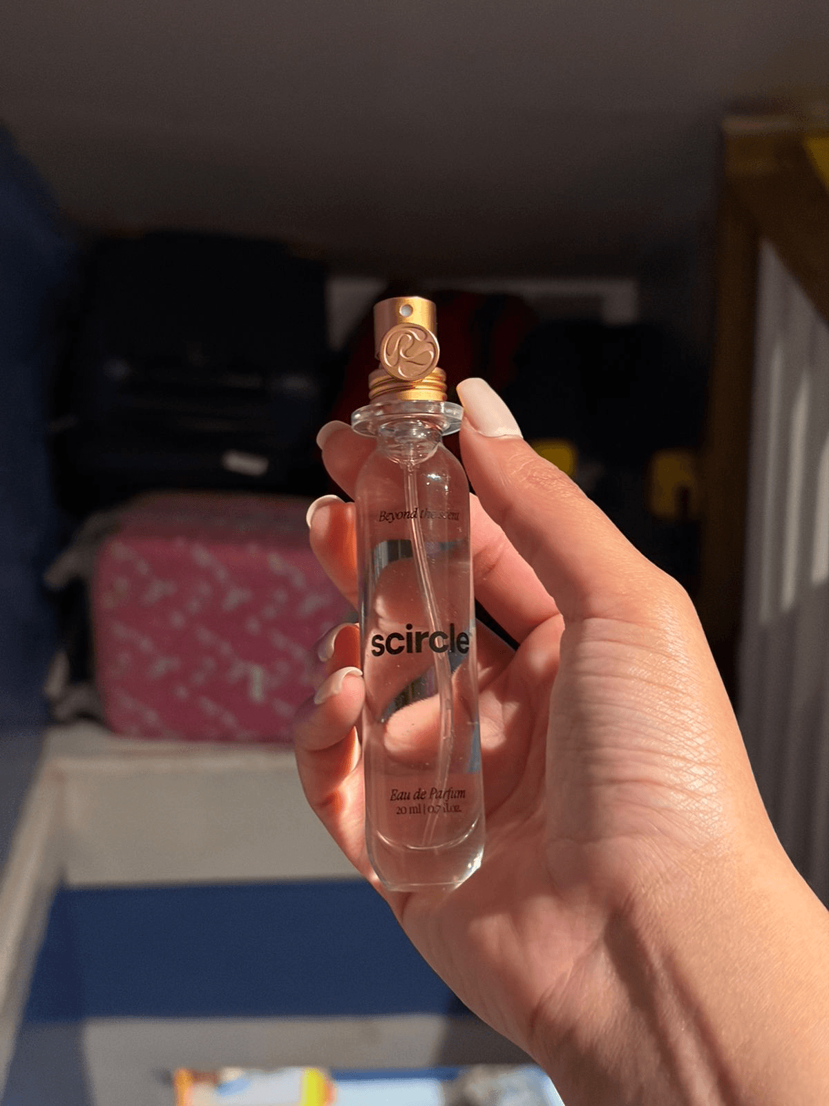 Customer holding Scircle bottle
